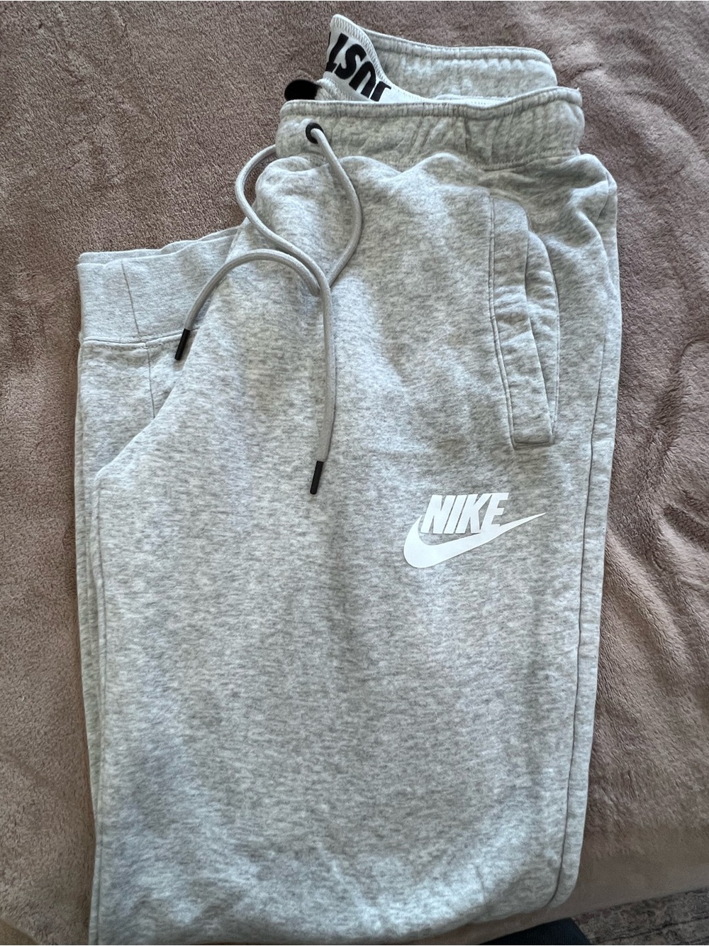 Nike Light Gray Women’s Fleece Joggers with White Swoosh